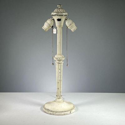 PAINTED CAST IRON LAMP | White painted cast iron table lamp having 2 bulbs and cast-iron top, no shade, not wired.