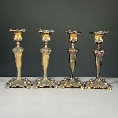 (4PC) SILVER PLATED CANDLESTICKS | Silver plated candlesticks marked Path, March 4, 1902.