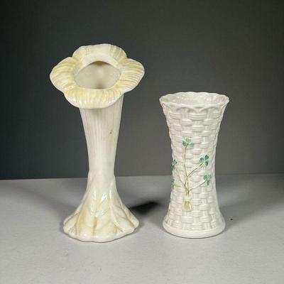 (2PC) BELLEEK FLOWER VASES | Including a cream lily shaped vase and a vase with woven basket pattern and clover decorations. Both made by...