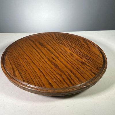 WOODEN LAZY SUSAN | Wooden lazy Susan with carved lip around the border. Dimensions: dia. 16 in