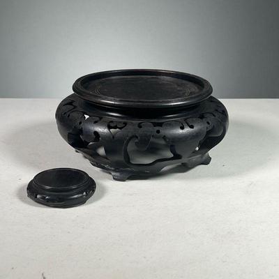 (2PC) CARVED WOODEN STANDS | Asian black carved wooden stands. Dimensions: h. 3.5 x dia. 7 in