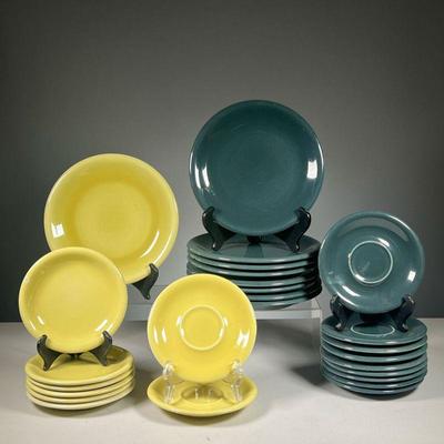 (26PC) ASSORTED RUSSEL WRIGHT DISHES | Sterling China by Russel Wright in dark green and yellow, including 5 Dark green saucers, 4 small...