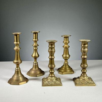 (5PC) BRASS CANDLESTICKS | Includes 2 different pairs of candlesticks, 1 pair with push-ups, 1 pair with elaborately decorated base, & 1...