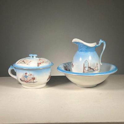 (3PC) CHILD'S WASHBOWL SET | Including a child's washbowl, pitcher, and a lidded chamber pot, all decorated with children and dachshunds....