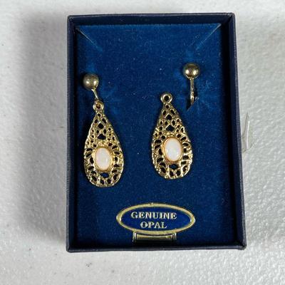 GENUINE OPAL EARRINGS | Clip-on Earrings with genuine opal from Elizabeth Farrell. Condition: One detached from post, as pictured