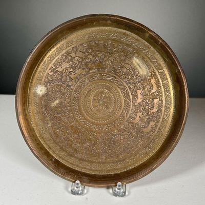 BRASS DECORATIVE PLATE | Features: Floral & wreath carvings with various animals.
