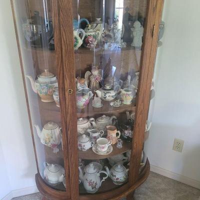 Very nice, rounded glass sides, curio cabinet