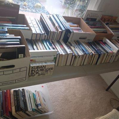 Lots of books - Grisham, airplanes, boats, coffee table, etc. 