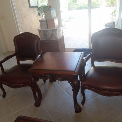 Pair of leather arm chairs 