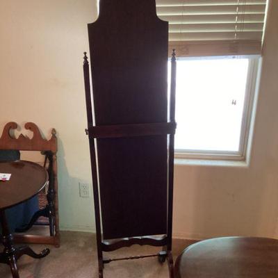 1920's antique mahogany cheval mirror
62 1/2 in tall
15 1/4 in. wide
($80.00)