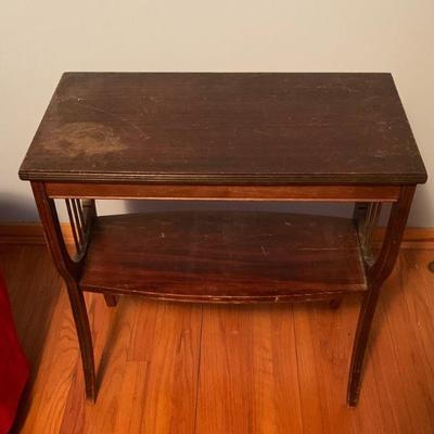 Lyre shaped Ends on small table