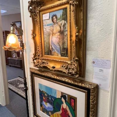 Another gallery view with painting, print and antique lamp.