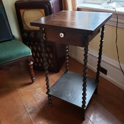 Accent table with a drawer and bottom shelf