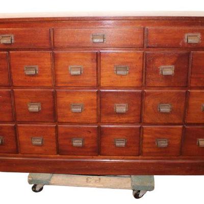 
Lot 239
Antique Rare model solid mahogany 21 drawer apothecary chest with dovetail drawers and in original finish
