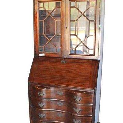 
Lot 226
Vintage ball and claw serpentine front slant front secretary bookcase with damage to fretwork
