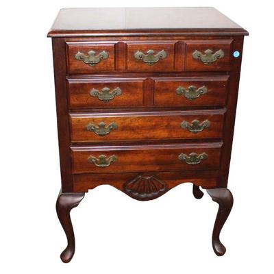 
Lot 374
American Drew solid cherry 4 drawer Queen Anne silver chest

