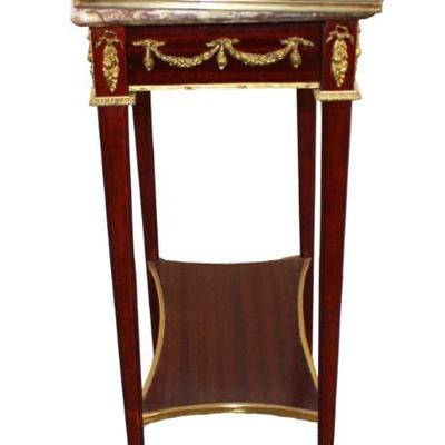 
Lot 150
French style marble top 2 tier stand with applied bronze
