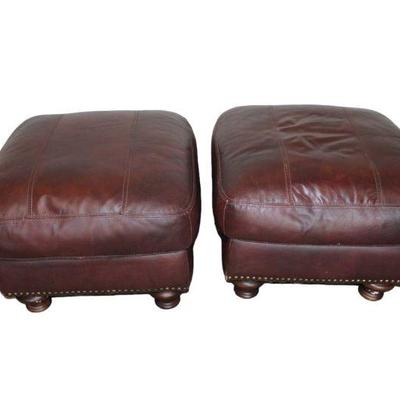 
Lot 406
Pair of industrial tacked leather ottomans approx. 25" w x 25" d x 19" h
