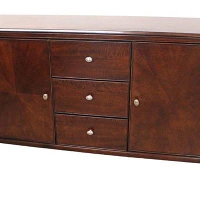 
Lot 305
Contemporary mahogany finish 3 drawer 2 door buffet in good condition
