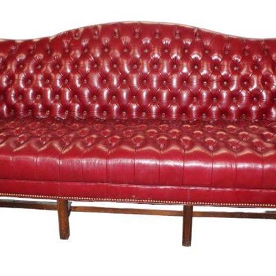 
Lot 324
Ethan Allen button tuft burgundy leather like sofa in the Chippendale style
