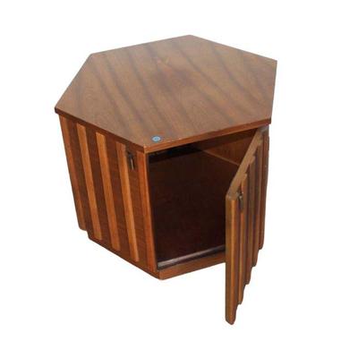 
Lot 193
Mid century octagon shape walnut lamp table with finish issues
