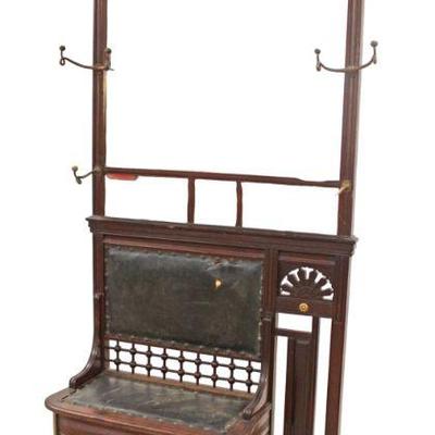 
Lot 124
Antique Victorian mahogany lift top hall rack bench with original hooks in good conditions and original drip pan
