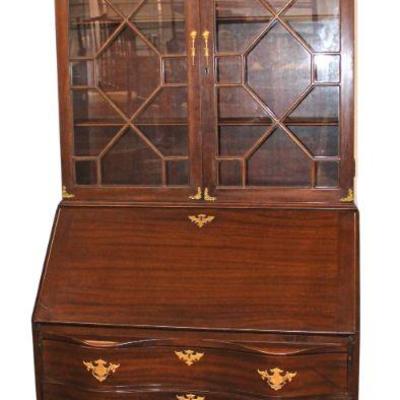 
Lot 349
Vintage solid mahogany serpentine ball and claw secretary bookcase
