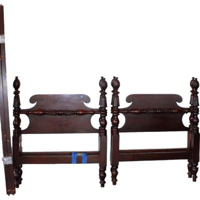
Lot 358
Nice pair of antique mahogany pineapple twin size bed with rails
