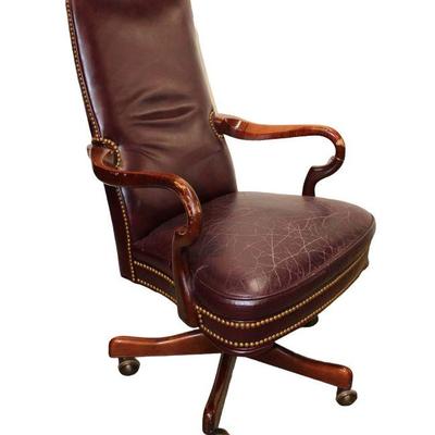 
Lot 174
Burgundy leather mahogany frame office chair
