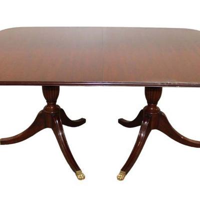 
Lot 140
Nice Henkel Harris solid mahogany dining room table with (3) 16