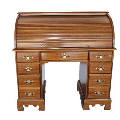
Lot 201
Vintage maple finish roll top desk
