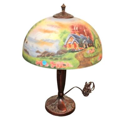 
Lot 260
Antique style reverse painted shade lamp with metal clad base
