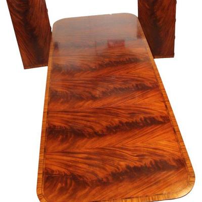 
Lot 299
Impressive 3 part banded burl mahogany dining room/banquet table with (2) 22" leaves, has veneer loss on sides, top has...