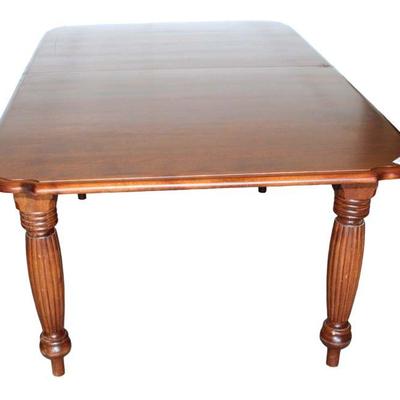
Lot 225
Nichols and Stone mahogany turn leg dining room table with (2) 18" leaves
