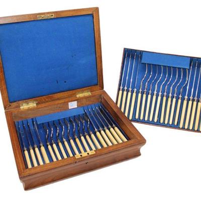 
Lot 383
Beautiful antique 36pc fork and knife set in the bone handle
