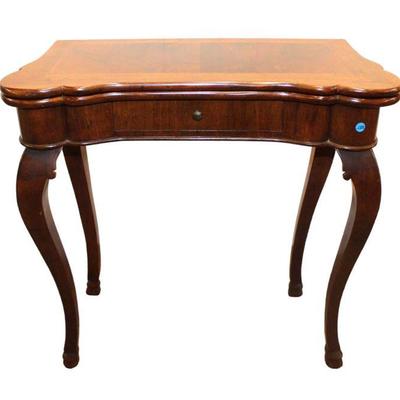 
Lot 139
Semi antique Italian solid mahogany flip top gate leg game table
