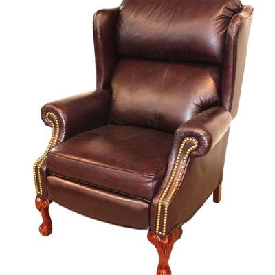 
Lot 300
Tacked leather reclining Chippendale style chair in good condition
