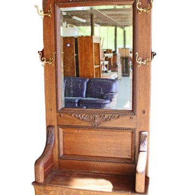 
Lot 242
Antique oak lift top hall seat with nice carvings
