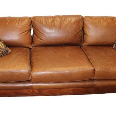 
Lot 244
Mission oak style frame leather 3 cushion sofa with pillows
