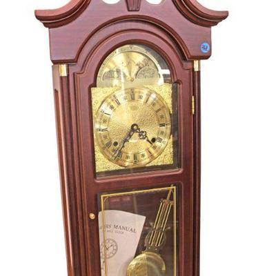 
Lot 268
Mahogany case regulator style wall clock with key and pendulum
