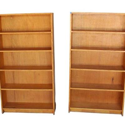 
Lot 212
Pair of cabinet made maple finish bookcases
