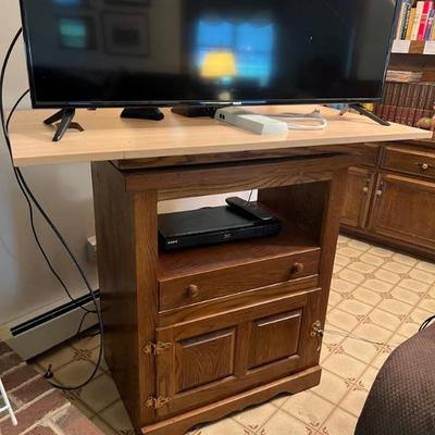 Oak TV cabinet w/swivel top $80