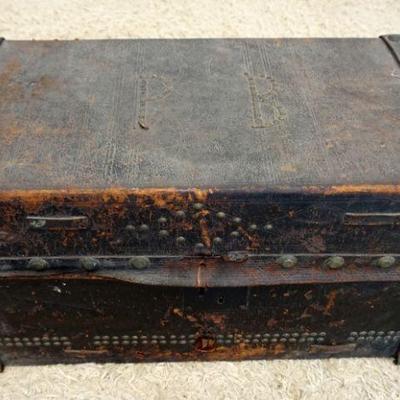 1250	ANTIQUE LEATHER TRUNK W/BRASS TACK ACCENTS, APPROXIMATELY 25 IN X 15 IN X 15 IN HIGH
