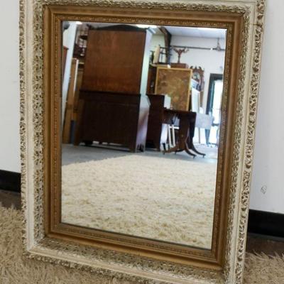 1124	ANTIQUE MIRROR IN ORNATE GESSO FRAME, APPROXIMATELY 25 IN X 32 IN
