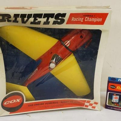 1216	COX VINTAGE GAS POWERED AIRPLANE *RIVITS* SEALED IN BOX W/FLIGHT KIT
