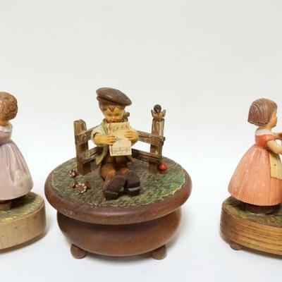 1020	LOT OF 3 SWISS WOOD FIGURAL MUSIC BOXES, TALLEST APPROXIMATELY 9 1/2 IN
