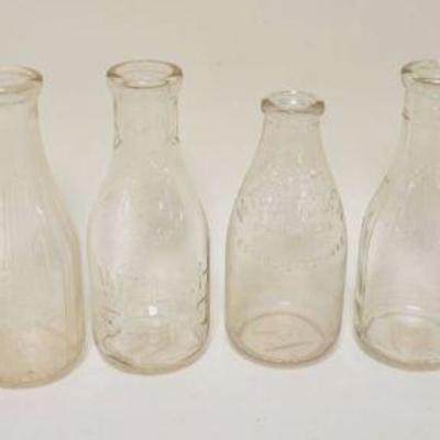 1164	LOT OF 8 ANTIQUE MILK BOTTLES INCLUDING WELSH FARMS, WILLOW BROOK, FLYING HILL FARM, ETC
