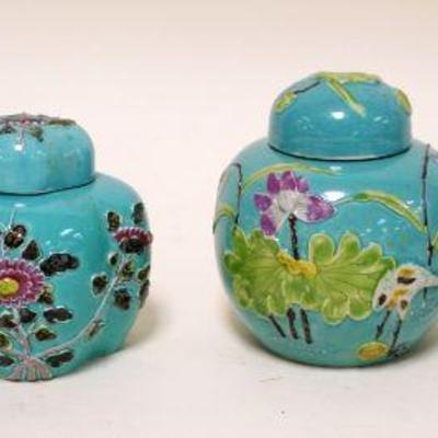 1238	4 ASIAN POTTERY COVERED JARS, APPROXIMATELY 4 1/2 IN HIGH
