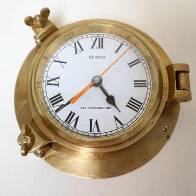 1136	SOLID BRASS REPLICA OF SHIPS CLOCK, APPROXIMATELY 9 IN X 3 1/2 IN HIGH
