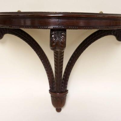 1131	CARVED WALNUT DEMILUNE WALL SHELF W/SCROLLED PLUME SUPPORTS, APPROXIMATELY 13 IN X 23 IN X 21 IN HIGH
